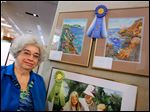  Elizabeth Jording of the Bedford Artists Club took first place in mixed-media art with ‘Seascape 1’ and ‘Seascape 2.’ The work is on display at the Bedford Branch Library in Temperance through May 21.