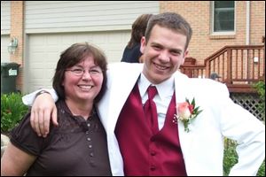 Matt Thompson with his mother before prom.