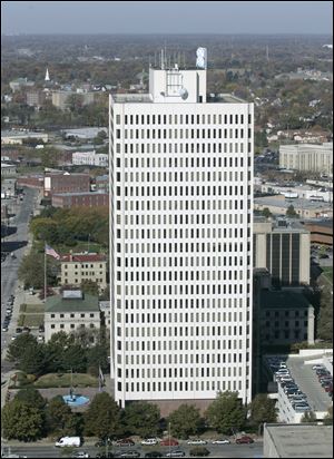 The Toledo mayoral candidates are all hoping to occupy the 22nd floor of One Goverment Center, above, home of the mayor's offices. 