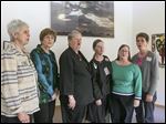  Thresh­old Choir members, from left, Teresa Teifke, Joyce Treat, Lynne Dunlap, Marie Wolfram, Amey Raihala, and Theresa Kusner sing to people who are terminally ill  at two local hospice centers.
