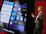  Thorsten Heins, president and CEO at BlackBerry holds up the new BlackBerry 10 mobile device at a conference in Orlando, Fla.