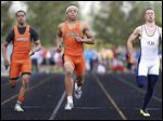  Southview junior Malcolm Johnson, center, wins the 100-meter dash ahead of teammate Jeremy Cook, left, and Liberty Benton’s Chase Cook at the Clay Invitational. Johnson is aiming for a third straight sweep of the 100 and 200 at the NLL meet.