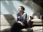  Kelly Morse, a counselor specializing in cancer genetics, talks about genetic testing in the lobby of the Hickman Cancer Center at Flower Hospital. ‘It’s more than a simple blood test,’ she says of looking for mutations that raise the risk of cancer.