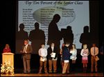  Members of the top 10 percent of the senior class take the stage one by one during this year's Senior Awards & Recognition Ceremony at Perrysburg High School. 