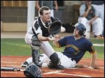  Whitmer’s Devin Thomas scores on An­thony Ok­die’s base hit during the second inning against Southview at Mercy Field. The Panthers won 6-1.