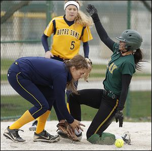 Clay’s Honnah Susor steals third base as Notre Dame’s Nikki Wilkins awaits the throw. Susor, a junior, leads the Eagles with a .603 batting average. Clay is 21-2 overall and 11-1 in the TRAC.