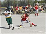  Clay’s Haley Dominique reaches base safely as Central Catholic first baseman Lauren Best attempts to dig out the throw.
