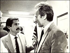 Thomas Walton, left, chats with Clint Eastwood during his run for mayor of Carmel, Calif.