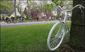 A 'ghost bike' is set up along Kenwood Blvd, between Ottawa Park and Toledo Children's Hospital during the 2011 Toledo Ride of Silence.