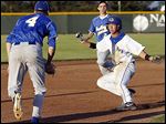  AW's Austin Kottenbrock gets caught in a pickle between Findlay pitcher Nolan Atwood(4) and SS Austin Powell (2) during the first inning  of a D-I sectional game on Thursday in Bowling Green.