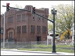  Crews continue their demolition of the old armory and surrounding buildings near downtown Bowling Green. The armory was built in 1910, and some of the first Bowling Green State Normal College students took classes there.