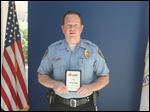  Perrysburg Police Detective Rich Cartwright receives MADD award. 