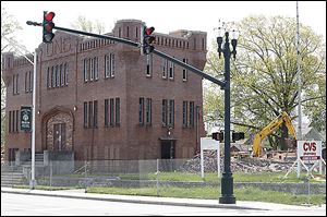 Crews continue their demolition of the old armory and surrounding buildings near downtown Bowling Green. The armory was built in 1910, and some of the first Bowling Green State Normal College students took classes there.