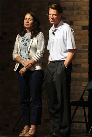 Brian and Cindy Hoeflinger speak to Ottawa Hills High School students and parents about their son senior Brian Hoeflinger, who died in a drunk-driving accident in February. The couple asked teens to sign a pledge to not drink alcohol.