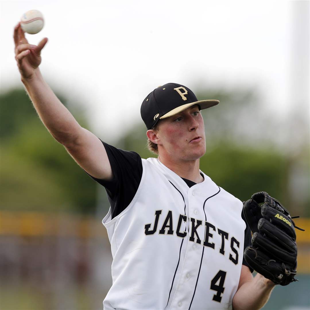 Perrysburg-pitcher-Nick-Munger-4-makes-a-throw-to-first-base