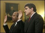  Ousted IRS chief Steve Miller, right, and J. Russell George, Treasury Inspector General for Tax Administration, are sworn in on Capitol Hill, in Washington today prior to testifying before the House Ways and Means Committee hearing on the Internal Revenue Service.