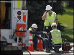  Columbia Gas crews work on fixing gas leak on Upton Rd. under I-475 in Toledo.