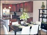 This lovely island kitchen is open to the dining area. Both are open to the great room.