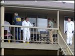  Federal authorities search an apartment in Boise, Idaho on Cassia Drive on Thursday afternoon. U.S. authorities in Idaho said they have arrested a man from Uzbekistan accused of conspiring with a designated terrorist organization in his home country and helping scheme to use a weapon of mass destruction. 