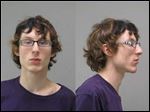  Sean Gossman, of Adrian, was arrested by Lenawee County authorities in connection with child pornography.