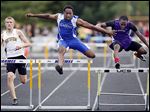  Ose Omofoma of Anthony Wayne leads Adam Downing, left, of Northview and Andre Johnson of Maumee on his way to winning the 300-meter hurdles at the NLL meet.
