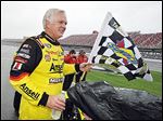  Frank Kimmel celebrates on pit road after winning the rain-shortened ARCA Series race May 3 at the Talladega Superspeedway.