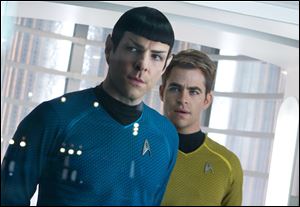 Zachary Quinto, left, as Spock and Chris Pine as Kirk star in the movie, 'Star Trek Into Darkness.'