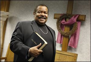 Bishop Nelson Clark poses at the Power House Tabernacle Pentacostal Christian Church in Toledo. He is celebrating 50 years as a minister.