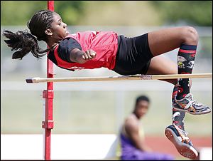 Rogers' Ashley Miller wins the City League's high jump. The Rams claimed the girls team title, finishing easily ahead of Start in Friday night’s meet.