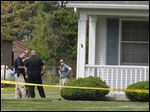  Waterville Township police and OHIO BCI crime scene unit investigate a fatal shooting on S. River Rd. In Waterville, Ohio.