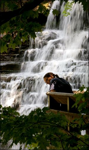 Alison Yasick views the scenery of  Brandywine Falls in Sagamore Hills.