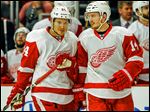  The Red Wings' Gustav Nyquist, right, smiles as he talks with Damien Brunner during Game 2 against Chicago. The duo are a major part of Detroit’s youth movement this season.