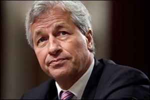 JPMorgan Chase's Jamie Dimon, chairman and CEO of the largest bank in the United States, faces a key test this week: His shareholders are voting on whether to let him keep both jobs.