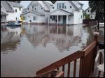 A pub owner and 28 others assert that negligence by city contractors doing a sewer repair caused the flooding in their West Toledo neighborhood in August, 2011. An attorney representing them said damage amounted to between $500,000 and $750,000.