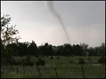  A tornado touches down southwest of Wichita, Kan. near the town of Viola on Sunday. The tornado was part of a line of storms that past through the central plains on Sunday.