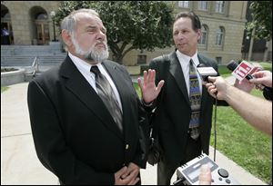 With court rulings in the long-running corruption case of Bob McCloskey, left, apparently at an end, Toledo City Council is being asked to pay the fees of Jay Feldstein, right, the lawyer who represented former Councilman McCloskey.