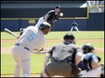  Syracuse's Chris Rahl makes contact on a pitch from Mud Hens starter Derek Hankins.