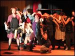  The cast of 3B Productions' presentation of 'Urinetown the Musical' rehearses for shows today through Sunday at the Maumee Indoor Theater.