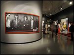  A large photo of the Rolling Stones dominates an exhibit space at the Rock and Roll Hall of Fame in Cleveland. The new exhibit 