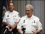  Toledo Deputy Police Chief Don Kenney talks during a news conference at the Safety Building about the shooting of Thomas Bean by Toledo police officers today. Captain Brad Weis is at back left.