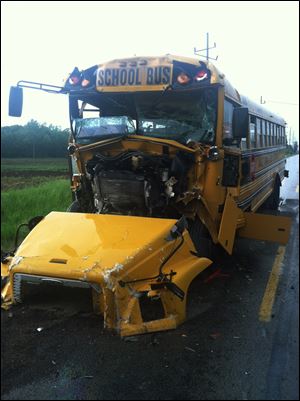 The front of a school bus that slammed into the back of another bus, setting off a chain-reaction crash involving four buses in North Webster, Ind.