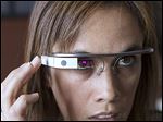  Monica Wilkinson wears Google Glass. A few non-Google employees are testing the device before it is ready for the general public.