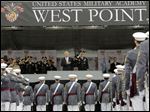  Defense Secretary Chuck Hagel, center left, and Superintendent Lt. Gen. David Huntoon, Jr., center right, stand for the national anthem during a graduation and commissioning ceremony today at the U.S. Military Academy in West Point, N.Y.