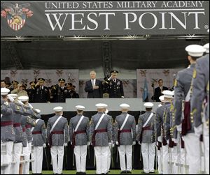 Defense Secretary Chuck Hagel, center left, and Superintendent Lt. Gen. David Huntoon, Jr., center right, stand for the national anthem during a graduation and commissioning ceremony today at the U.S. Military Academy in West Point, N.Y.
