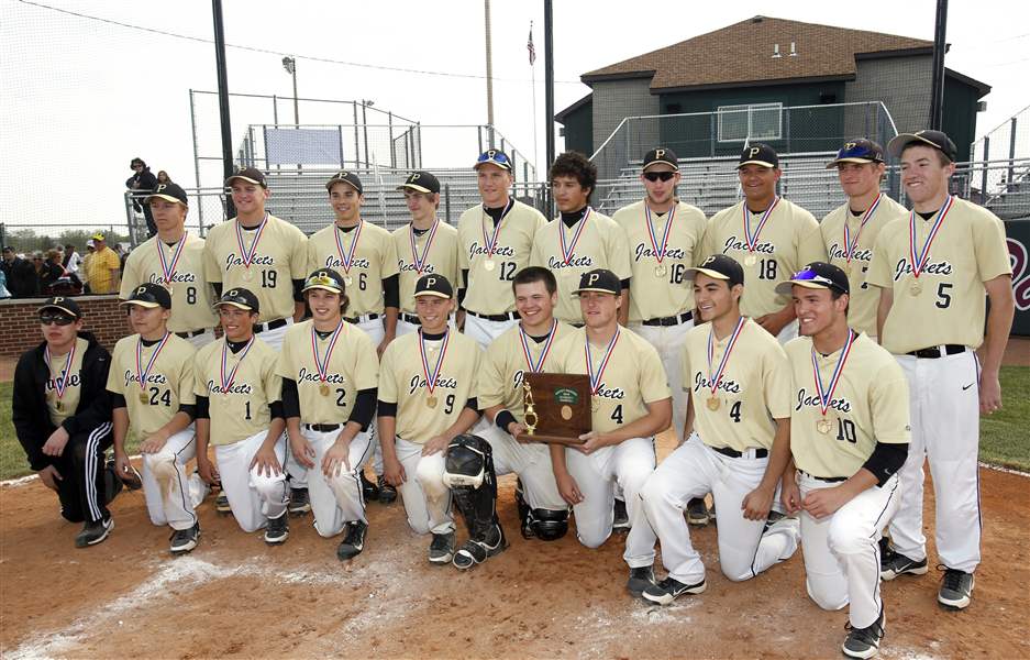 Perryburg-baseball-players-celebrate-after-defeating-Norwalk