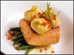  By placing the meat on top of the vegetables, you build height and add more interest than the old standard of vegetables on the side.