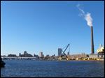  A view of downtown Milwaukee from the Kinnickinnic River, not far from where it connects with Lake Michigan. Milwaukee officials hope its proximity to water provides the backbone to a revitalized economy.