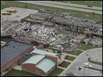  Damaged school buses sit next to Lake High School in Lake Township in Wood County, Ohio, Sunday, June 6, 2010, after it was destroyed by a tornado.