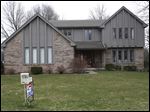  Home prices in suburbs, such as this one in Sylvania, are rising faster than those in Toledo, Realtors say. 