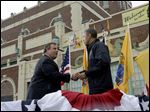  President Obama and New Jersey Gov. Chris Christie walk along the boardwalk during their visit to Point Pleasant, NJ., today.